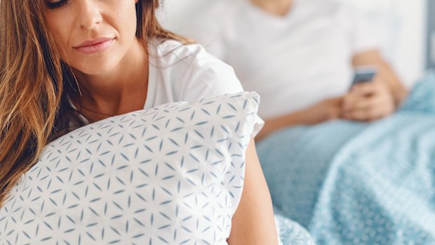 Couple in bed together