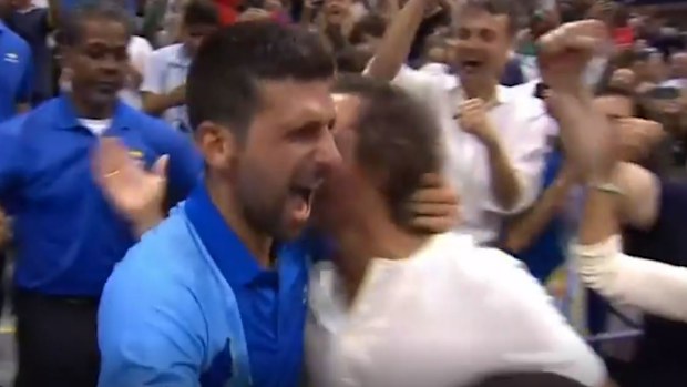 Novak Djokovic hugs Matthew Matthew McConaughey