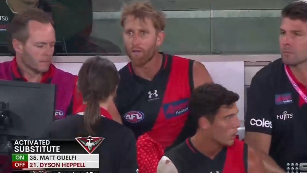 Dyson Heppell appears shocked as he is told he has been subbed out of the match.