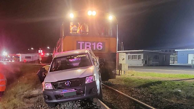A ute has been hit by a train and pushed along the tracks in Devonport in Tasmania's north west.