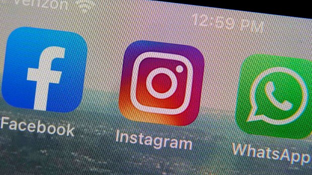 Instagram app appears on a phone screen.