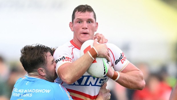 Tom Gilbert in action for the Dolphins in a trial against the Titans.