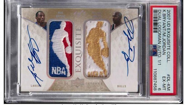 A signed sports card featuring the photos of Michael Jordan and Kobe Bryant.
