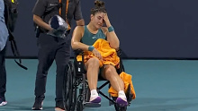 A heartbroken Andreescu was carted off the court in Miami after turning her ankle in the fourth round clash