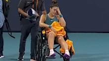 A heartbroken Andreescu was carted off the court in Miami after turning her ankle in the fourth round clash