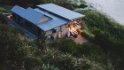 Why do Australians feel the deep, aching pull and sacred power of the holiday house? 