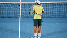 SYDNEY, AUSTRALIA - JANUARY 06: Storm Hunter of Australia and Matthew Ebden of Australia embrace in the semi-final doubles match against Alexander Zverev of Germany and Laura Siegemund of Germany during the 2024 United Cup at Ken Rosewall Arena on January 06, 2024 in Sydney, Australia. (Photo by Brett Hemmings/Getty Images)