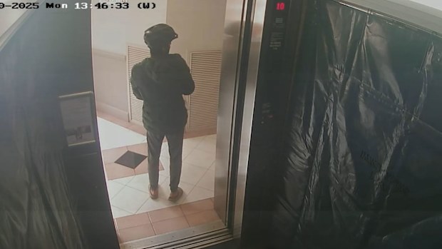 Delivery driver appears to urinate in lift Sydney