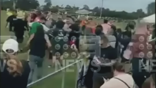 A Brisbane father has sustained serious injuries following a wild brawl at a junior rugby league game over the weekend, with new footage showing the escalation of the altercation. 
