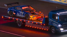 The battered Ford Mustang is towed back to the pits after Christopher Mies' high-speed encounter with a kangaroo.