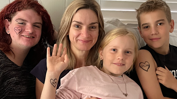 Carolyn Tate and her three kids.