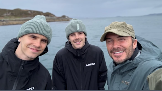 David Beckham with sons Cruz and Romeo on birthday fishing trip.