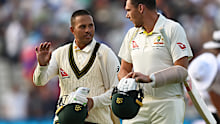 Usman Khawaja (left) and Scott Boland.