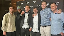 Patrick Cripps celebrates his Brownlow Medal with friends. 