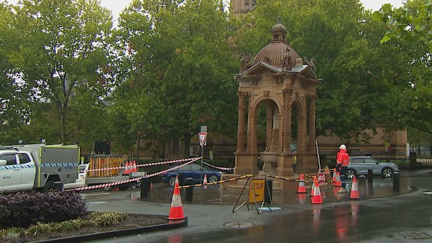 A large sinkhole has opened up on a busy street in Sydney CBD, forcing a nearby school to close and leaving businesses without water.