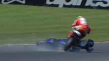 Jorge Navarro is ridden over by Simone Corsi at Phillip Island.