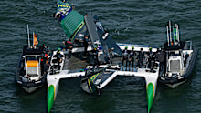 Australia SailGP Team helmed by Tom Slingsby are attended to by their support boat after the main wing broke during racing on Race Day 2 of the Oracle San Francisco Sail Grand Prix.
