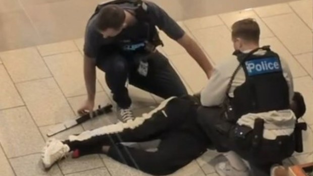 A machete was found alongside a boy who was arrested in a Melbourne shopping centre yesterday.
