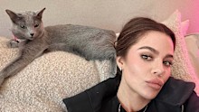 Khloe Kardashian with one of her cats.