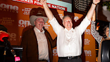 ALBURY, AUSTRALIA - MAY 09: Victorious One Nation candidate, David Farley, takes to the stage as his party wins the Farrer by-election on May 9, 2026 in Albury, Australia. The May 9 contest, triggered by Sussan Ley's resignation after being ousted as Liberal leader by Angus Taylor in February, has since evolved into a rare four-cornered race between the Liberals, the Nationals, an independent and One Nation  with polling suggesting the minor party could secure as much as 29 percent of the primar