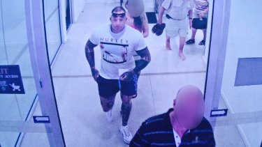 Surveillance photo of Joshua Faulkhead boarding a plane to Sydney.