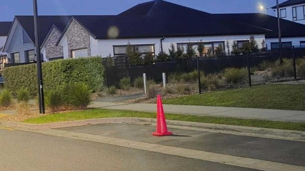Occupants of an Auckland house have been using a road cone to mark out "their" parking spot.