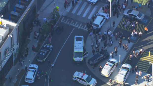 A 15 year-old boy and another man have been arrested after the incident at Northland Shopping Centre in Preston at 2.30pm, Victoria Police said.