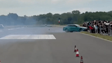 The car crashed into spectators at the drag race in Poland.