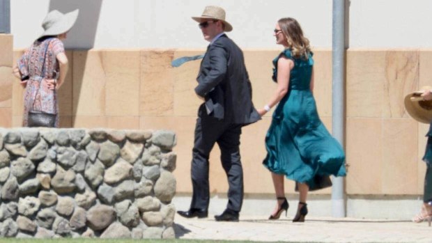 Former prime minister Chris Hipkins and partner Toni Grace arrive at the wedding of Jacinda Ardern and Clarke Gayford
