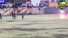 The moment lightning strikes a football player in Peru.