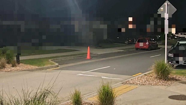 The cone in the parking spot on a Milldale street.