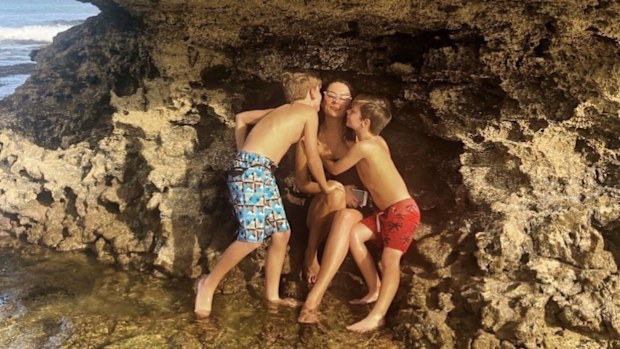 Merrin Schnabel at the beach with her two sons.