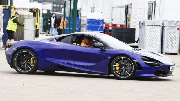 Daniel Ricciardo at the wheel of his McLaren 720S that he has listed for sale.