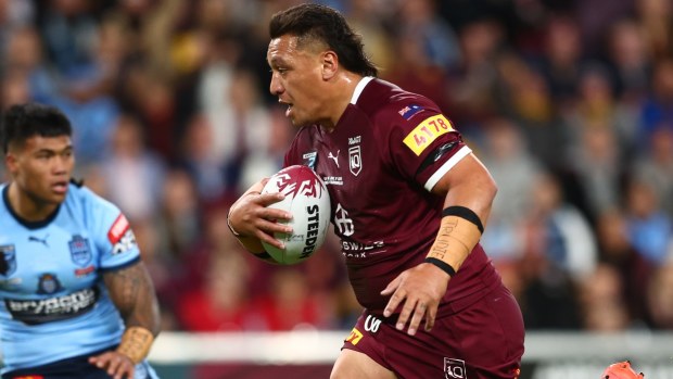 Josh Papalii of the Maroons runs the ball during game three of the State of Origin Series between the Queensland Maroons and the New South Wales Blues at Suncorp Stadium.