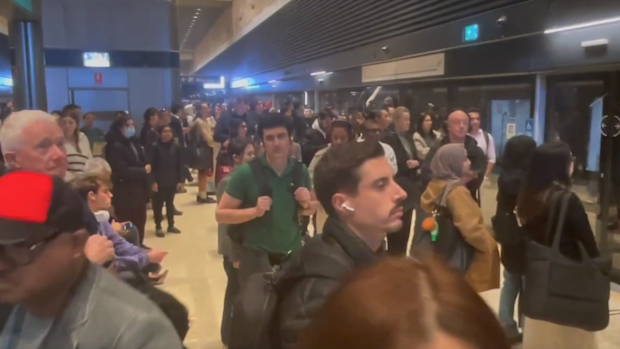 Crowds wait at Barangaroo station.