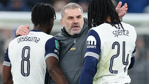 Tottenham manager Ange Postecoglou celebrates with Yves Bissouma and Djed Spence after the Carabao Cup semi final first leg match against Liverpool at Tottenham Hotspur Stadium on January 08, 2025 in London, England. (Photo by Harry Murphy - Danehouse/Getty Images)
