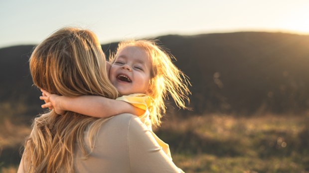 Toddler girl with her mum 