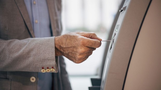 Queensland Police have charged an aged care worker over alleged purchases she made on an elderly man's credit card.  