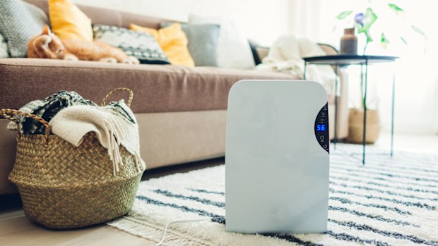 Dehumidifier with touch panel in a living room. 
