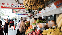 Woman shopping for fresh fruit at a Vietnamese grocery store in Cabramatta, a vibrant multicultural community in southwest Sydney  New South Wales, Australia