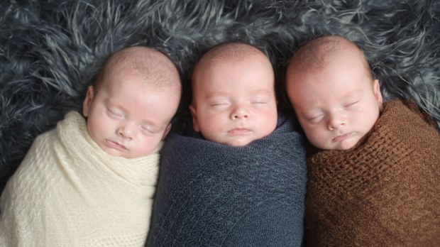 Triplet babies at a newborn photoshoot