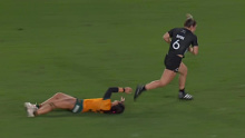 Michaela Blyde runs away from the Australian defence.