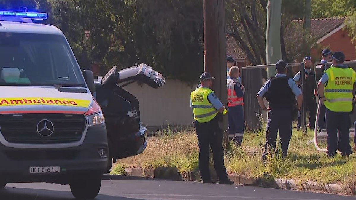Police officer trapped in vehicle following two-car crash in Sydney's ...