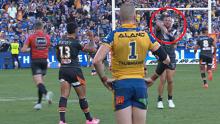David Klemmer gives Clint Gutherson an up yours after his miss. 