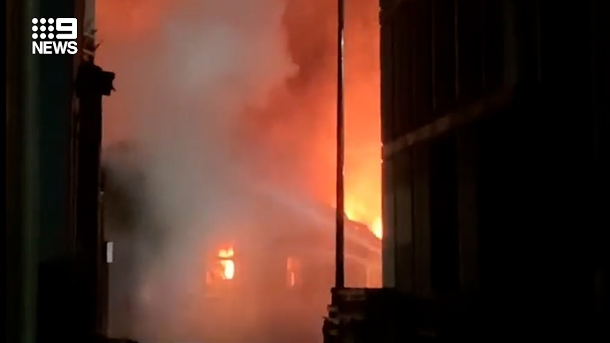 Factory fire burns in South Melbourne spewing smoke over city, forcing ...