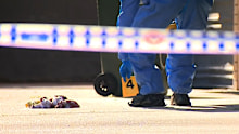 A 68-year-old man is in hospital after he woke up to a man inside his apartment in Brisbane this morning.