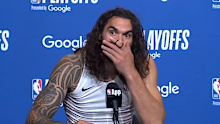 Steven Adams reacts after jokingly swearing at an Australian reporter in the press room. 