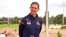Stephen Larkham talks to reporters.