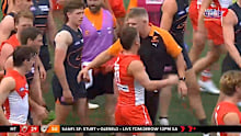Tom Papley and Jason McCartney collide.