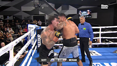 Curtis Scott and Liam Messam trade blows.
